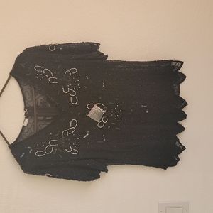 New evening blouse. Never used. Tags with extra buttons still attached